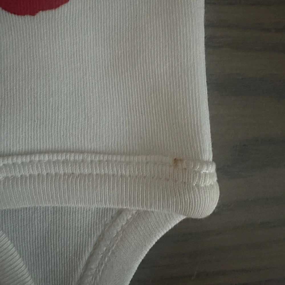 SARAH KETY BABY BODYSUIT
